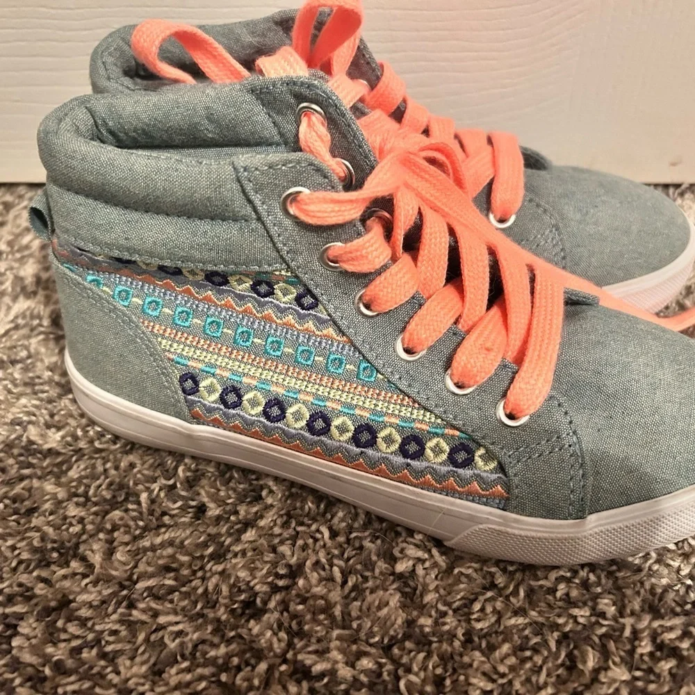 Colorful High-Top Sneakers with Orange Laces